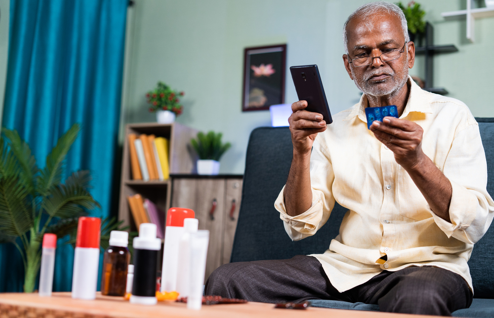 3 Major Benefits of Same Day Medicine Delivery - Senior man checking about availability, purchasing or ordering online medicines on mobile phone from home - concept of E-Pharmacy and searching about medications - borzo delivery